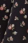 Preview: 60 den gemusterte Feinstrumpfhose "Charlotta" in schwarz mit kleinen Rosen Gr. S bis L
